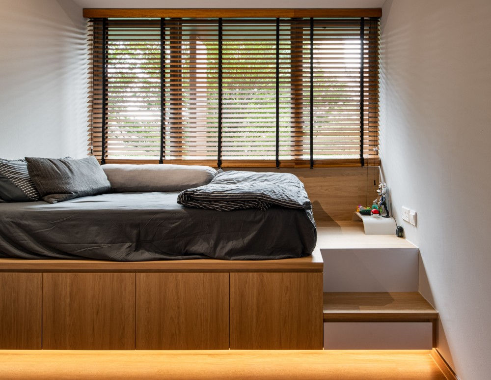 contemporary bedroom with platform bed and vinyl flooringv