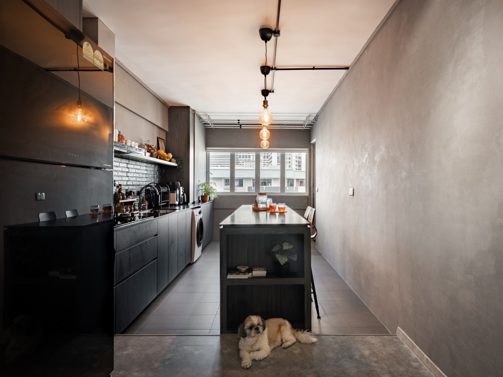 industrial kitchen with homogeneous tiles and kitchen island