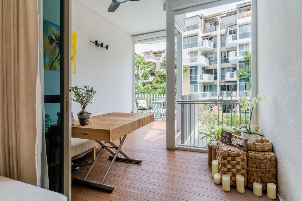 modern balcony with outdoor table and seating bench