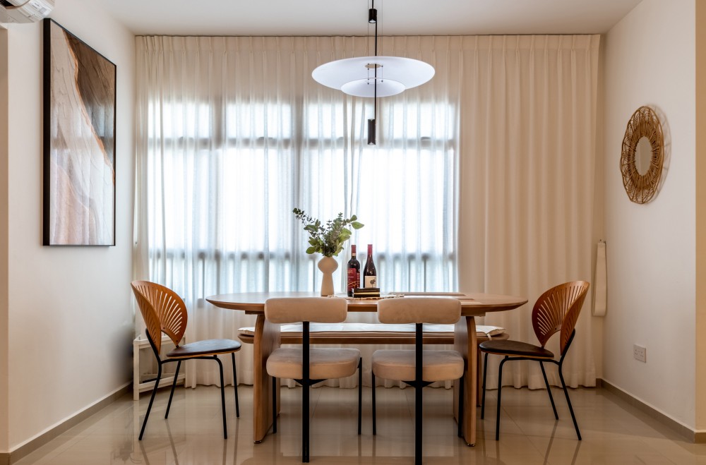 scandinavian dining room with curtain and dining table