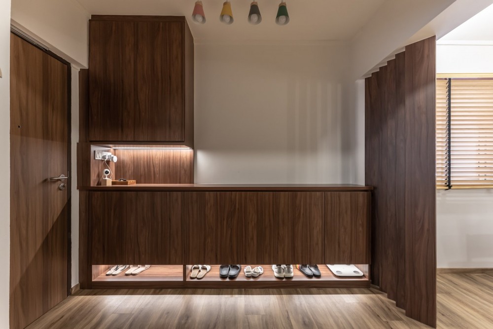 scandinavian entryway with shoe rack and console table