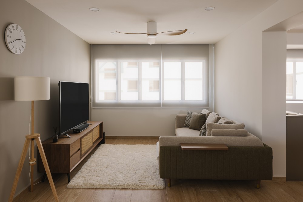 scandinavian living room with wood flooring and tv console