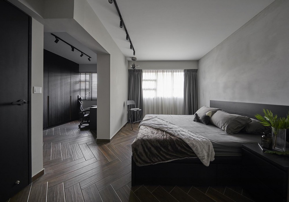 industrial bedroom with ceiling light and curtain