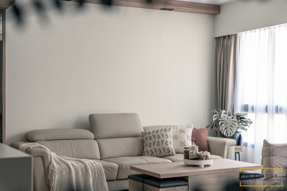 minimalist living room with feature wall and bay window