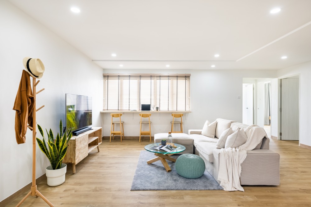 minimalist living room with vinyl flooring and tv console