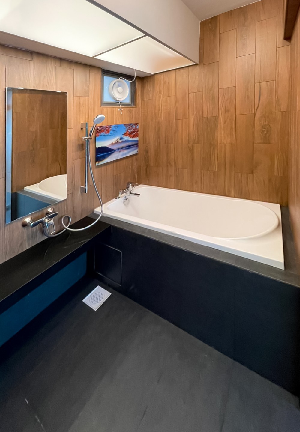 scandinavian bathroom with mirror and bathroom storage