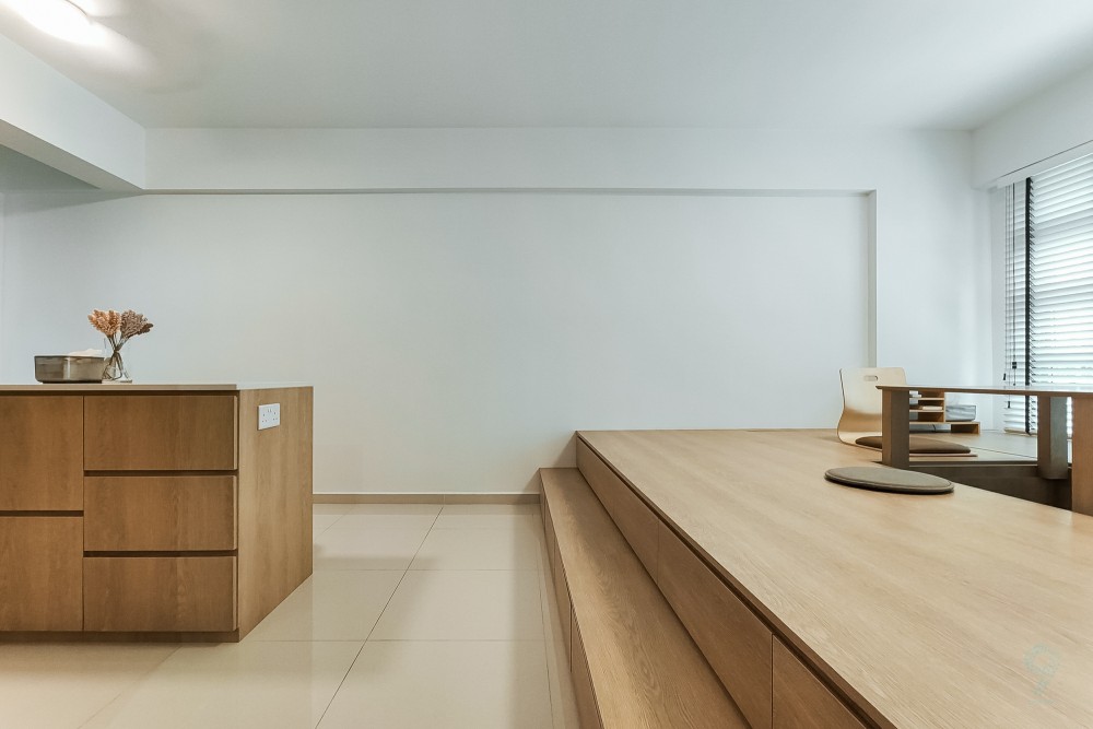 scandinavian living room with vinyl flooring and feature wall