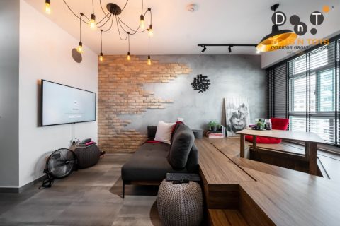 industrial living room with feature wall and sofa