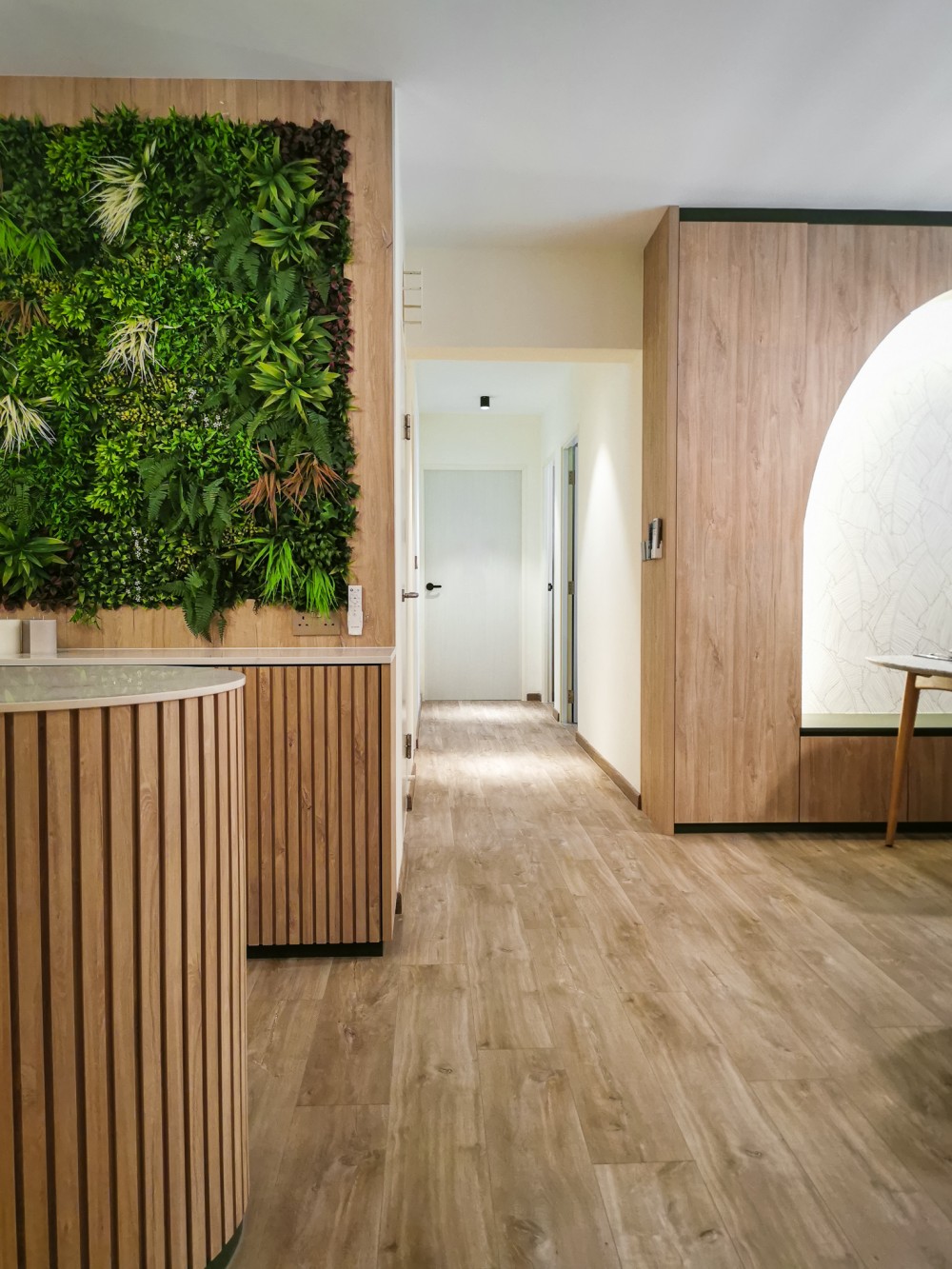 contemporary hallway with vinyl flooring and feature wall