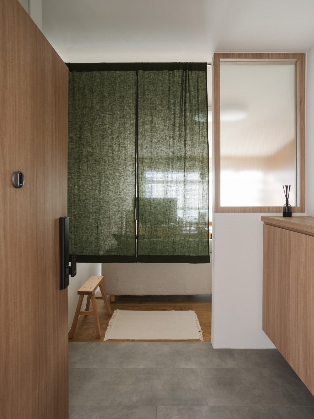 modern entryway with curtain and stools