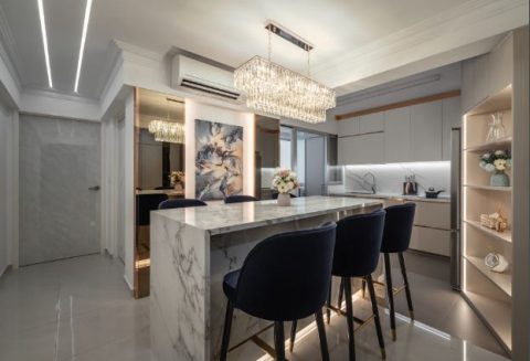 modern dining room with cove lighting and chandelier