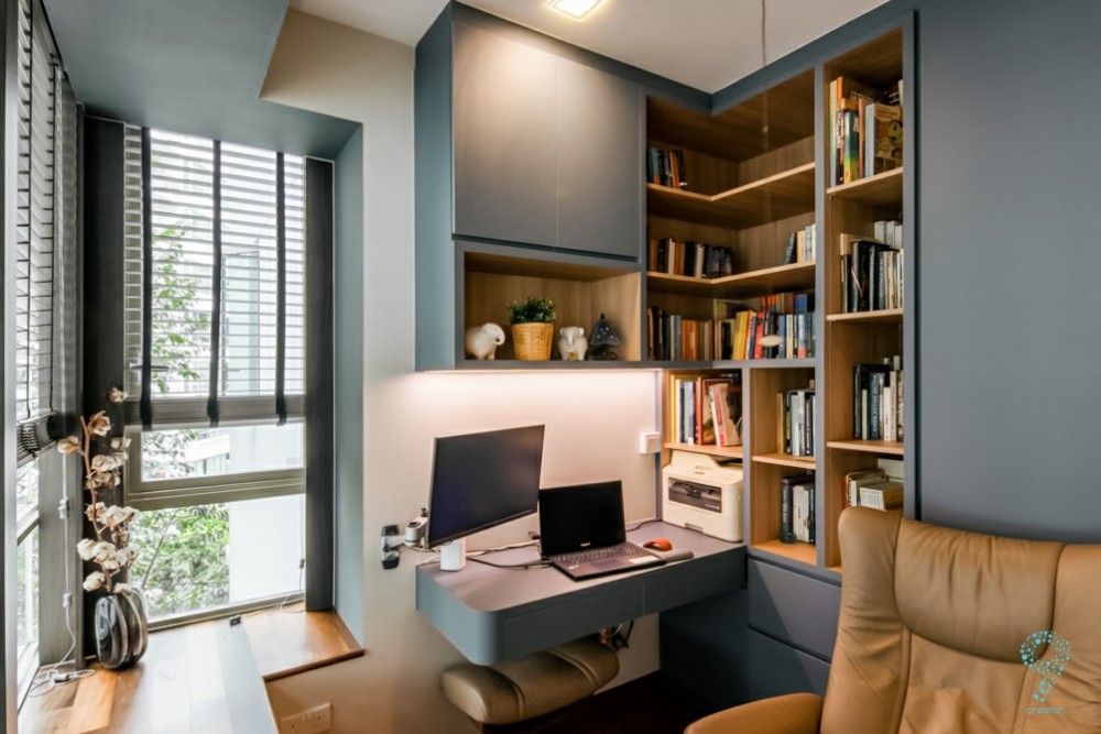 country study with bookshelf and ceiling light