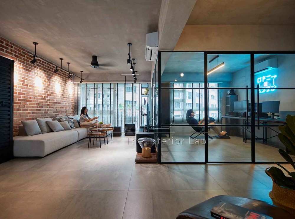 industrial living room with feature wall and glass door