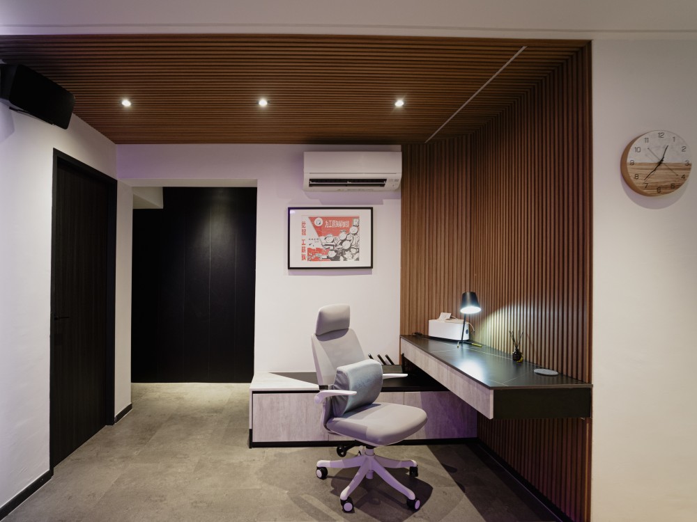 modern home office with feature wall and desk