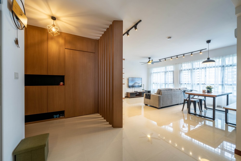 scandinavian living room with homogeneous tiles and tv console