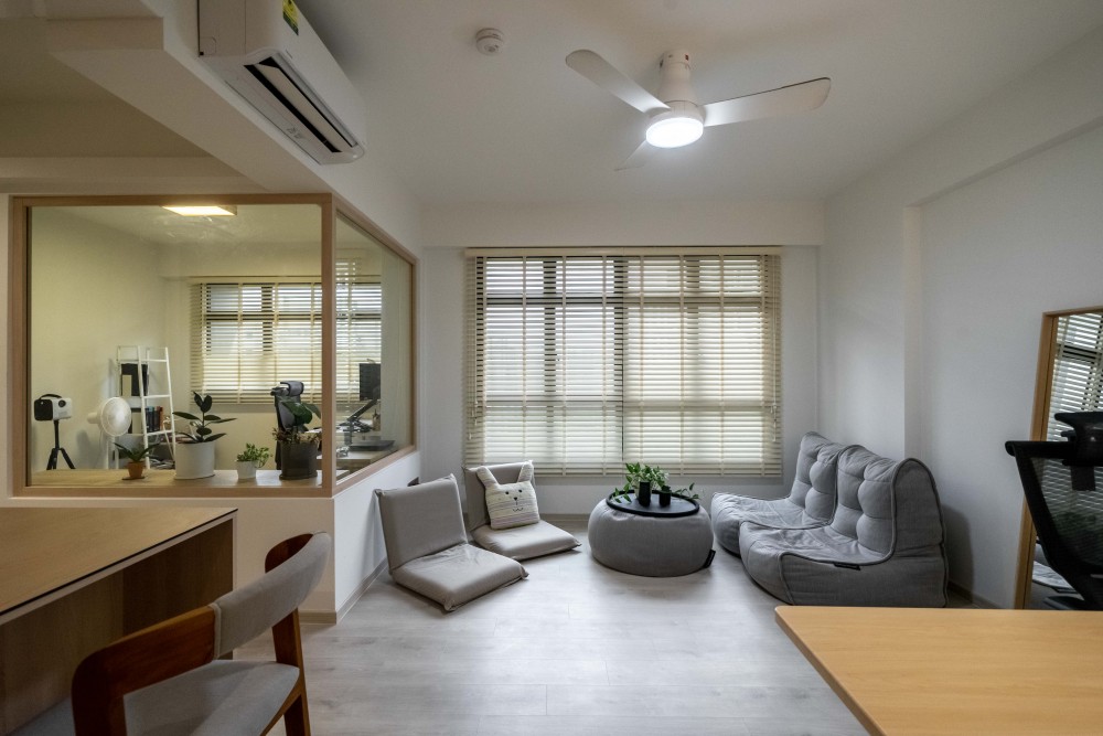 minimalist living room with homogeneous tiles and tv console