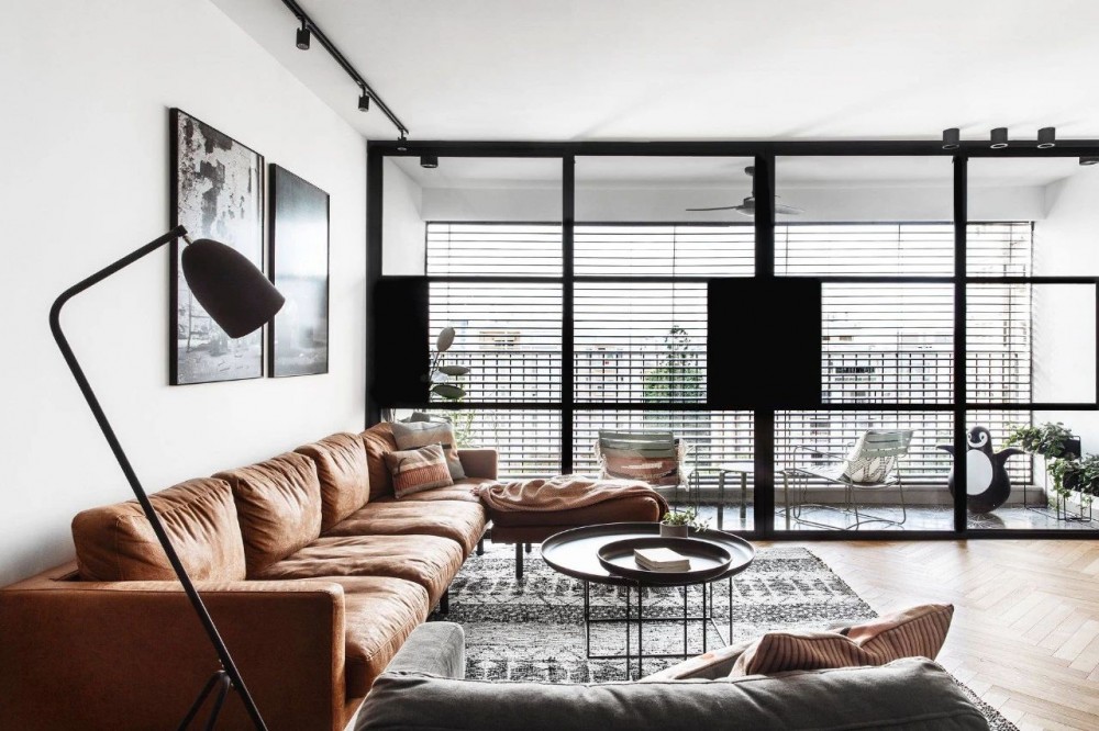 contemporary living room with roller blinds and sofa