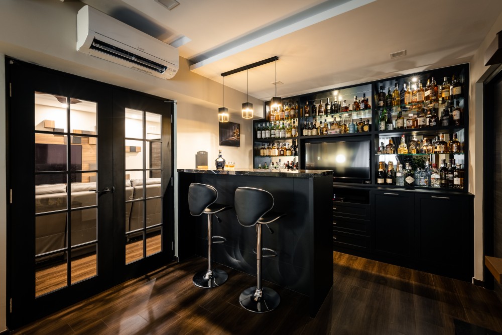contemporary home bar with countertop and bar counter