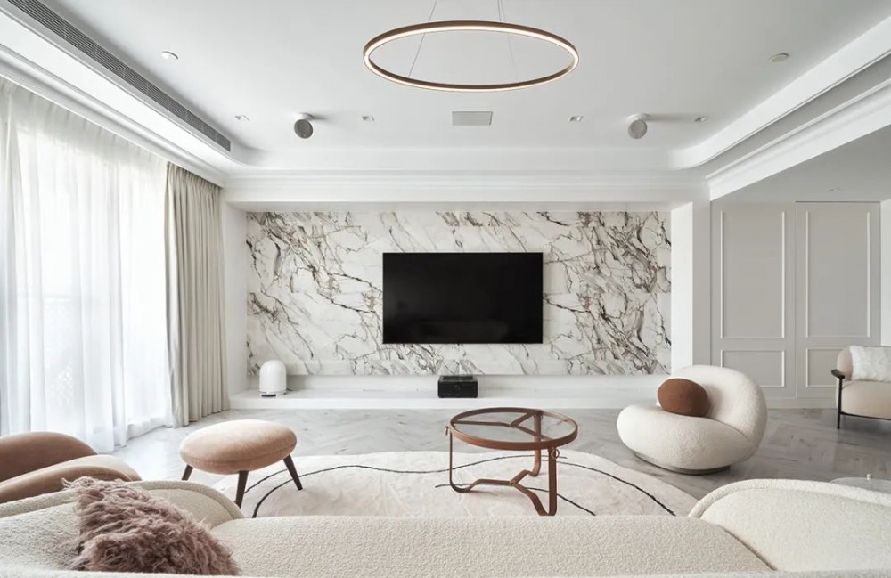 contemporary living room with herringbone tiling and feature wall