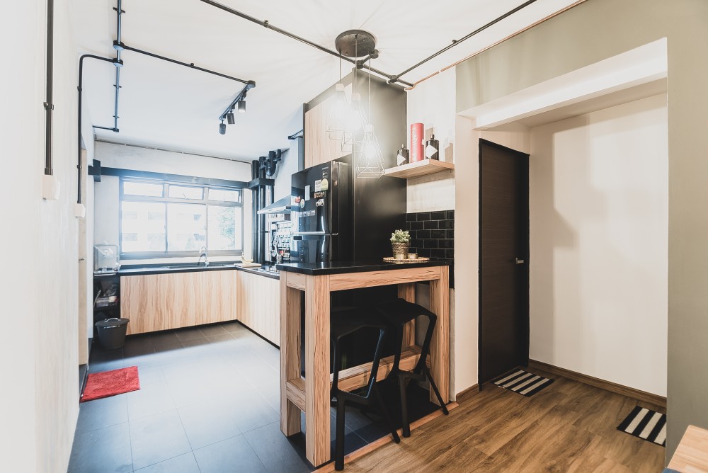 industrial kitchen with homogeneous tiles and kitchen island