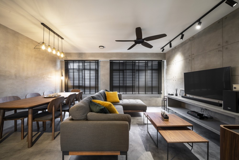 industrial living room with cement floor and tv console