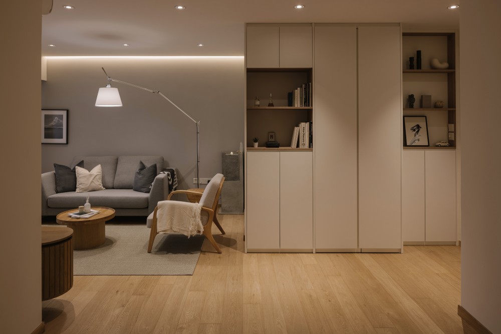 modern hallway with bookshelf and vinyl flooring