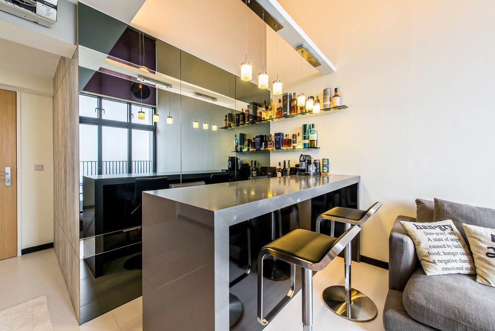 modern home bar with countertop and mirror