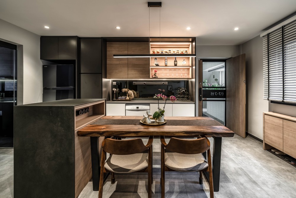 contemporary dining room with drop light and dining table