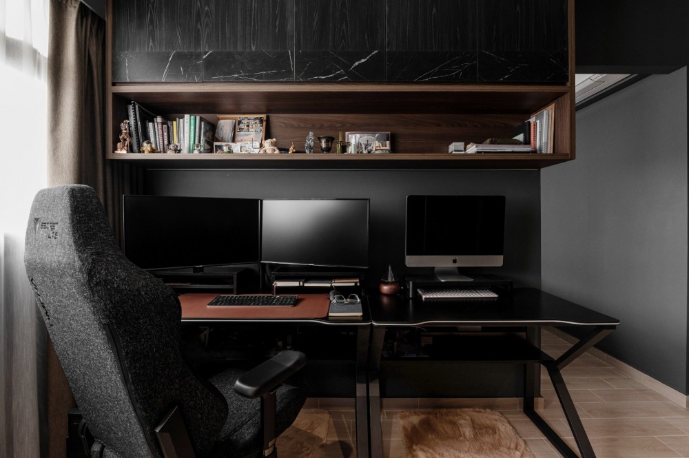 contemporary study with storage cabinets and bookcases