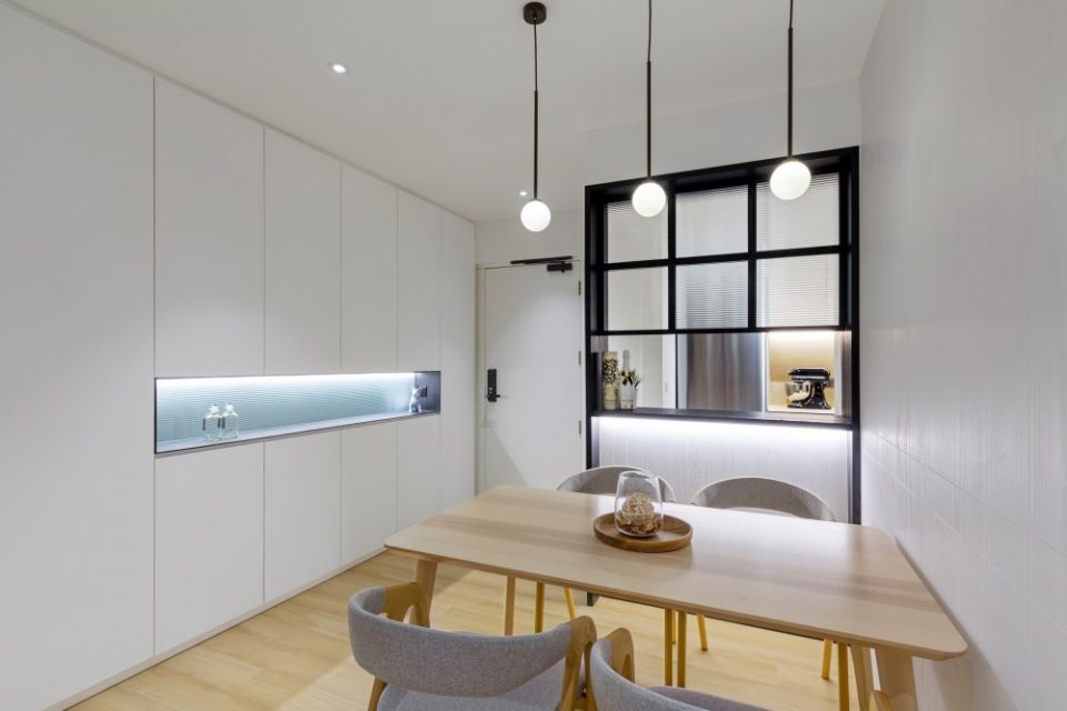 minimalist entryway with shoe rack and small storage