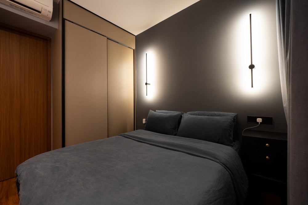 modern bedroom with cove lighting and wardrobe
