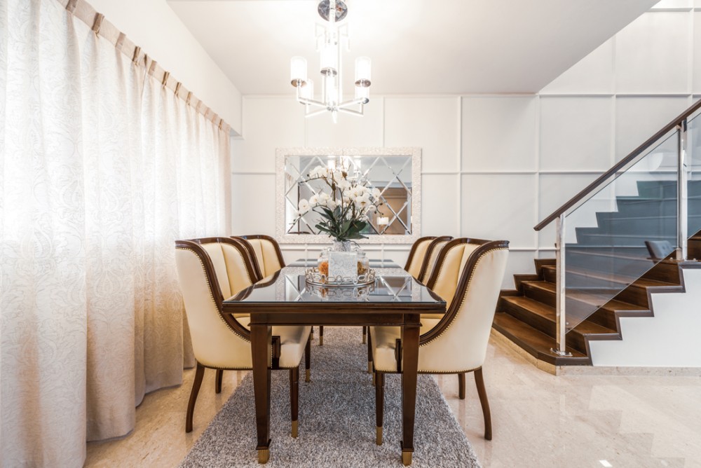 modern dining room with feature wall and mirror