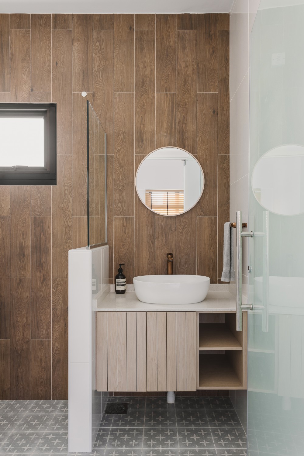 scandinavian bathroom with mirror and bathroom storage