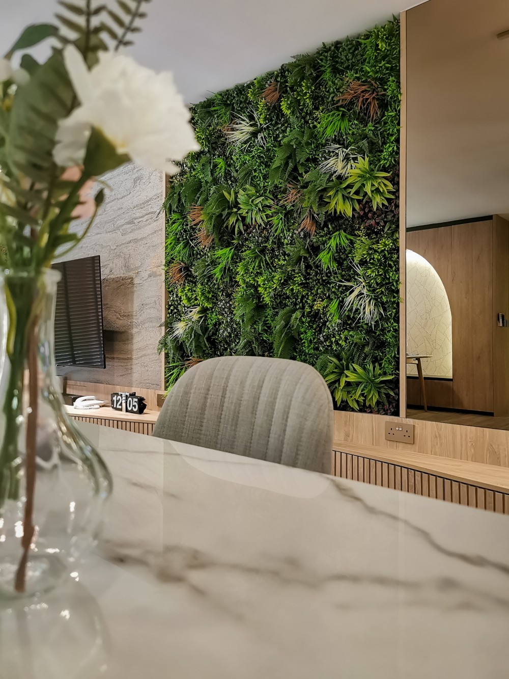 contemporary entryway with countertop and mirror