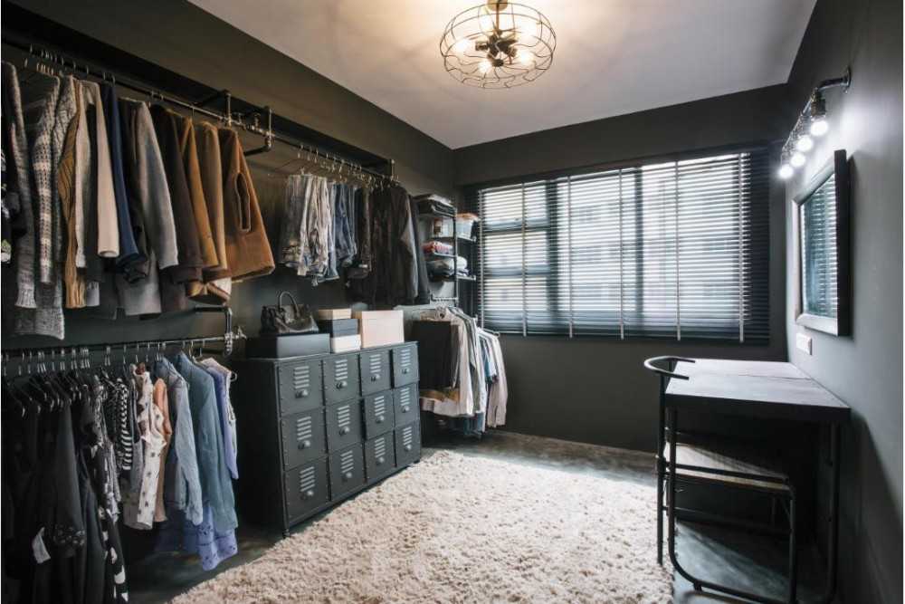 industrial walk in wardrobe with desk and coat rack