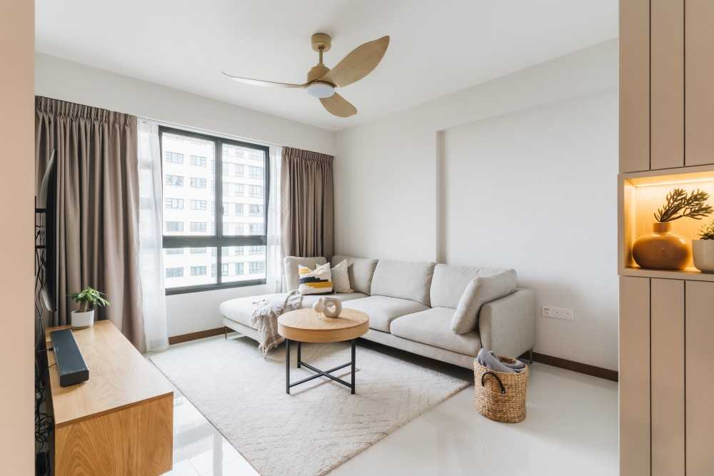 scandinavian living room with ceiling fan and curtain