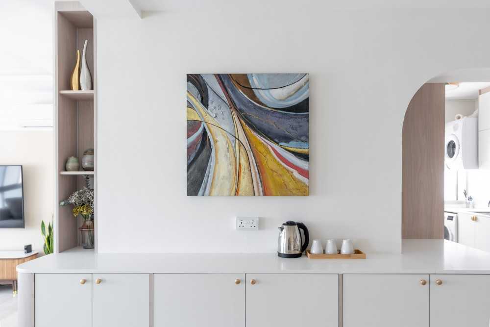 minimalist foyer with artwork and console table