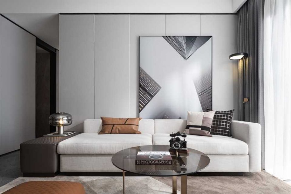 contemporary living room with homogeneous tiles and feature wall 2