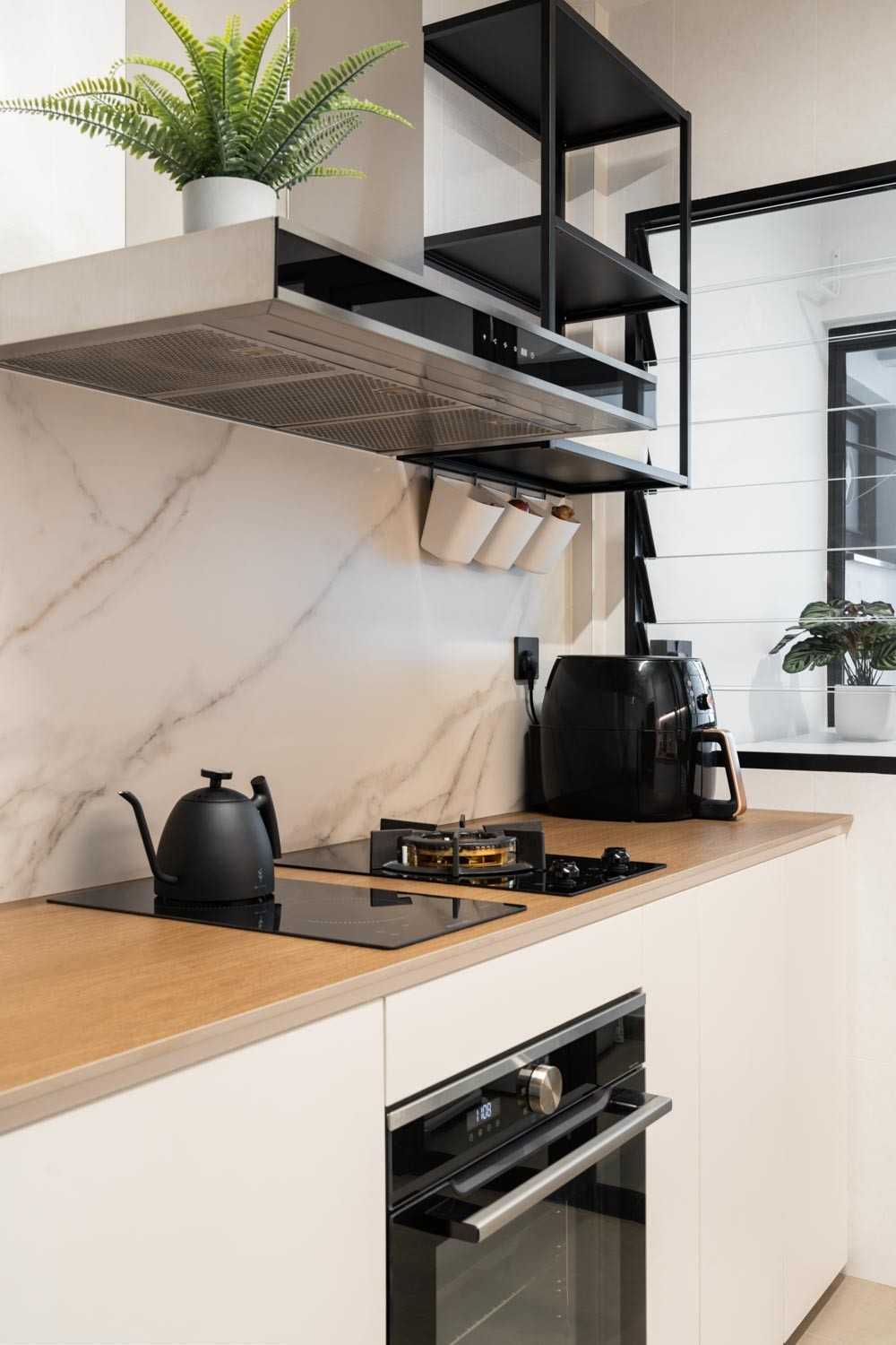 minimalist kitchen with homogeneous tiles and kitchen window