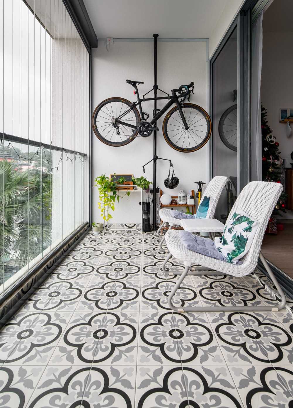 scandinavian balcony with window seat and outdoor chairs