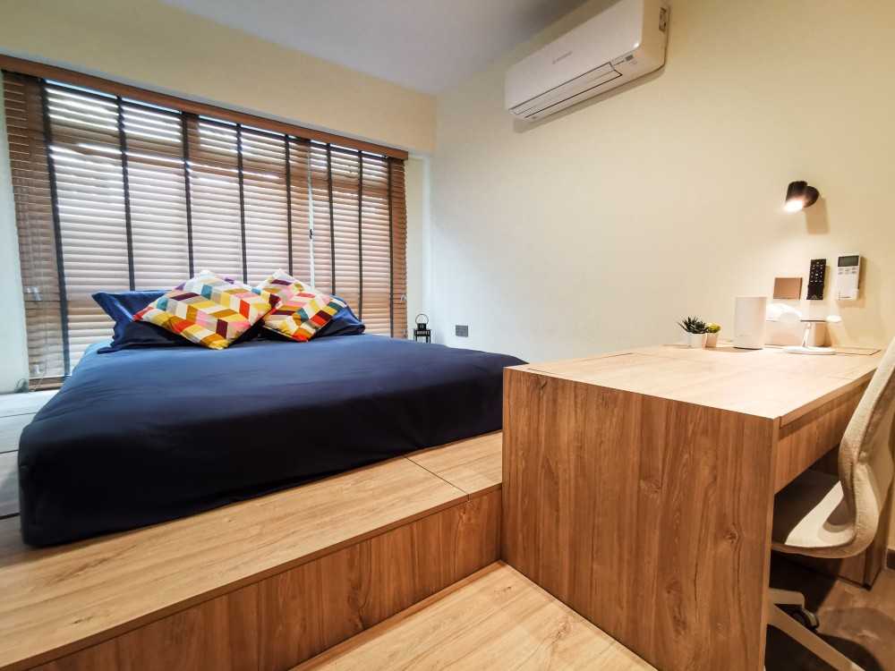 contemporary bedroom with platform bed and bed