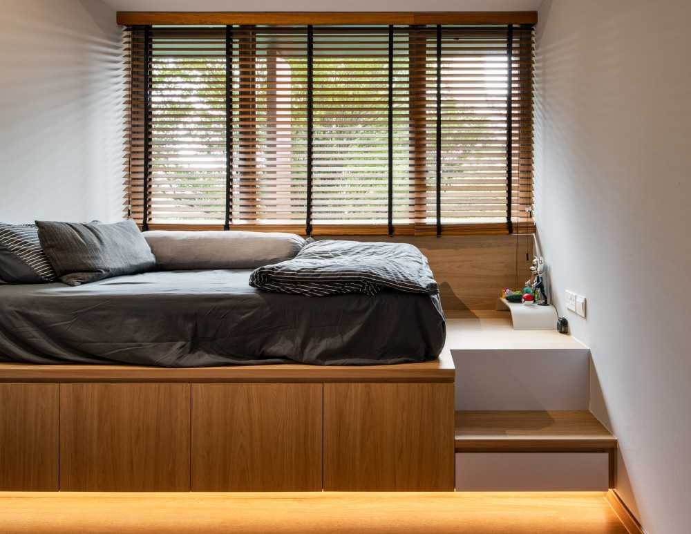 contemporary bedroom with platform bed and vinyl flooring