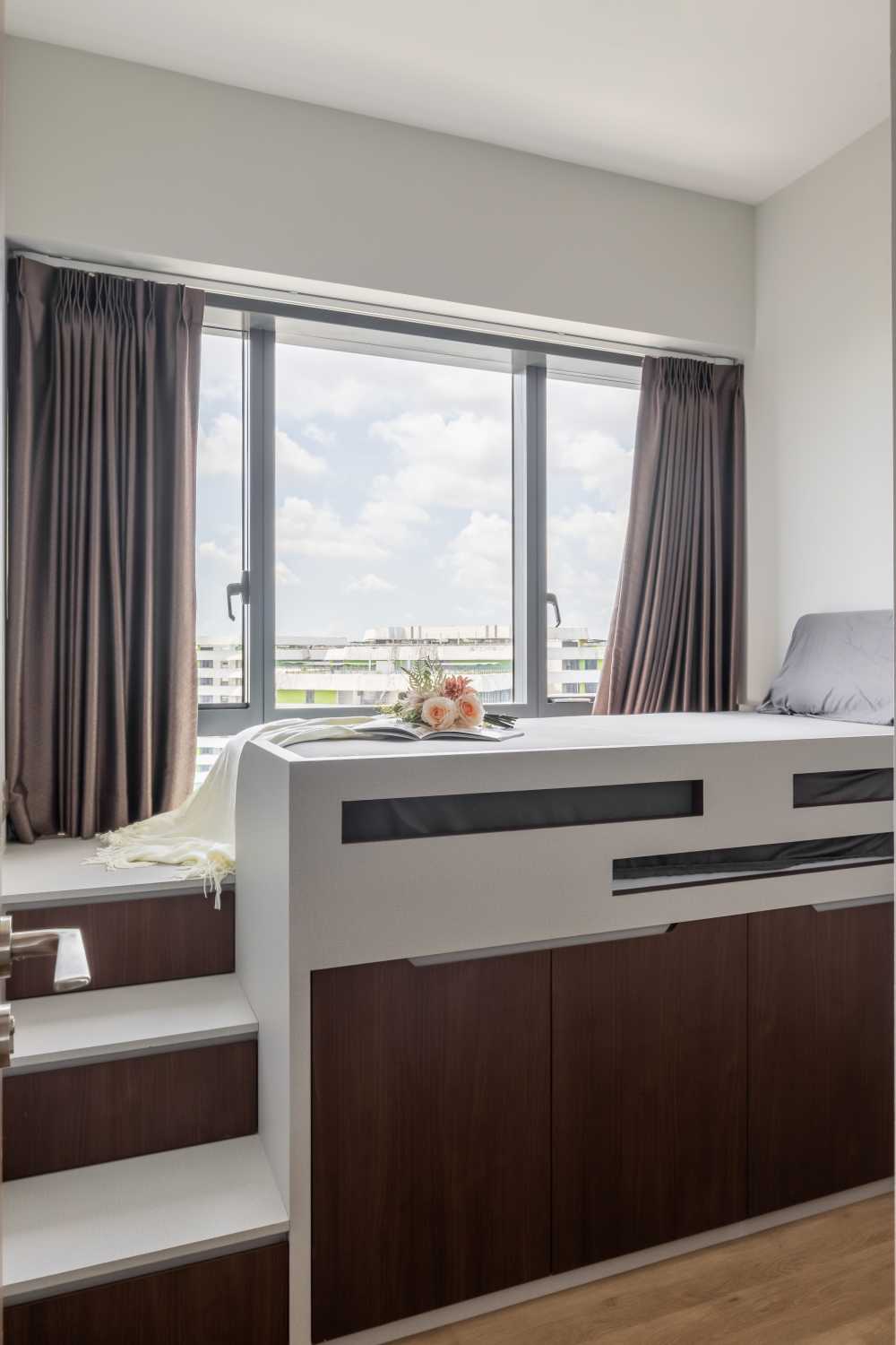 contemporary bedroom with platform bed and wardrobe