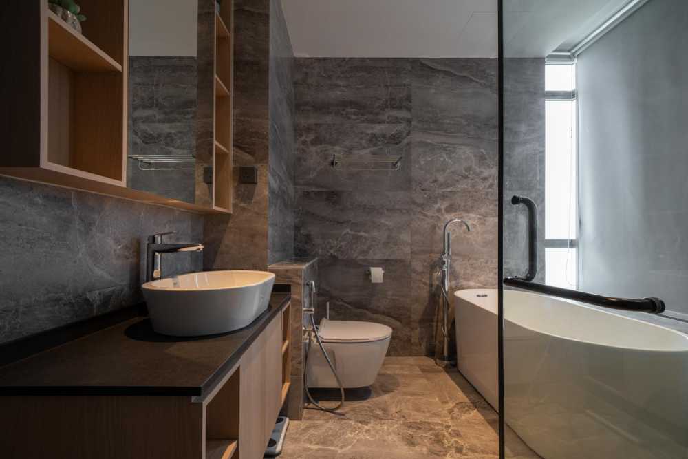 modern bathroom with homogeneous tiles and herringbone tiling