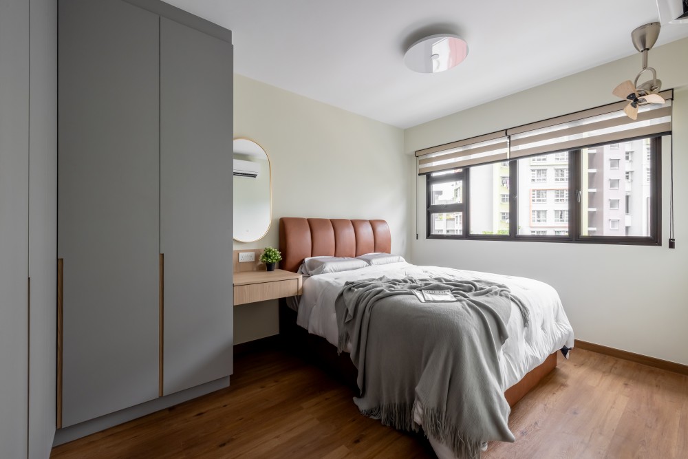 minimalist bedroom with vinyl flooring and wardrobe