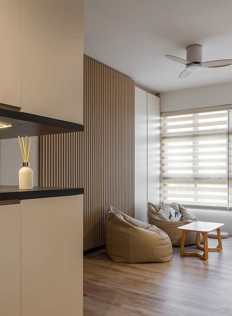 asian living room with bookshelf and coffee table