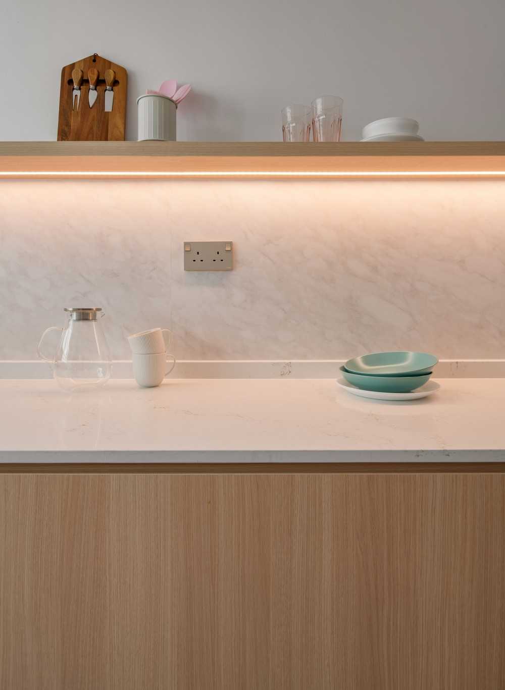 minimalist kitchen with countertop and kitchen backsplash
