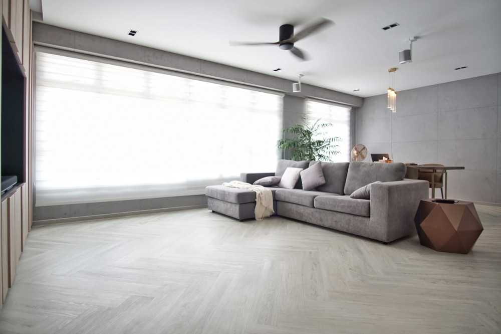 minimalist living room with homogeneous tiles and drop light