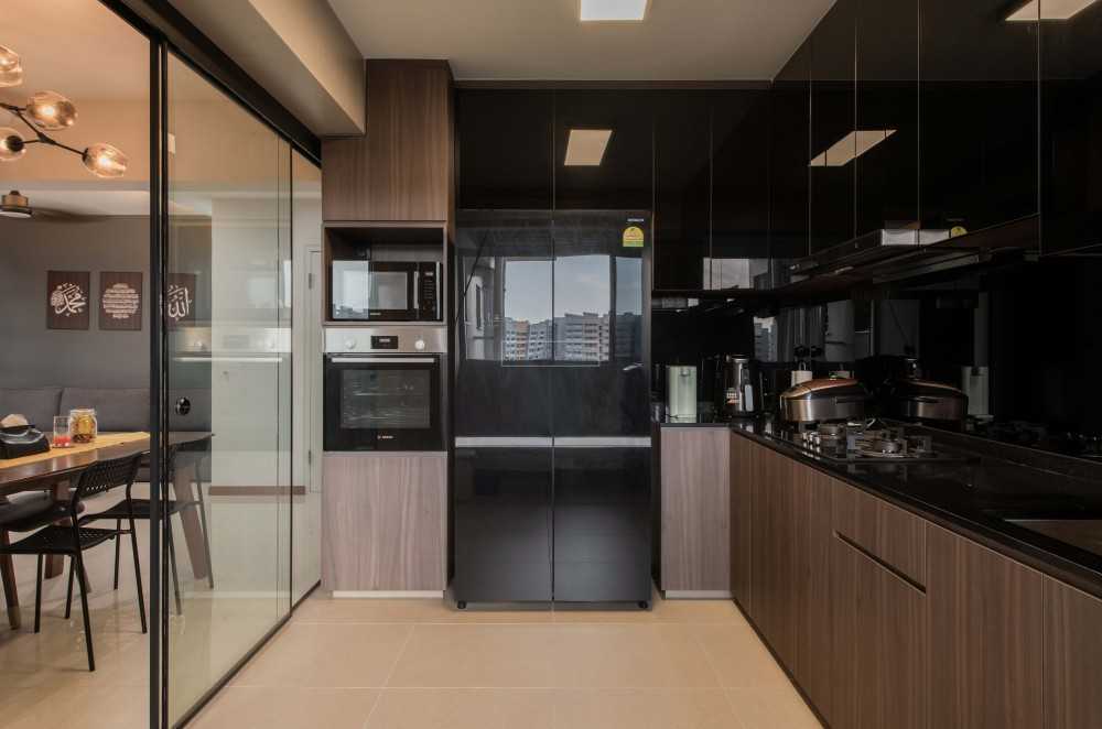 modern kitchen with countertop and glass door