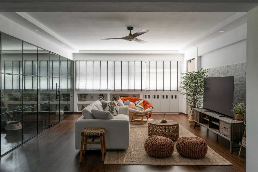 scandinavian living room with feature wall and glass door